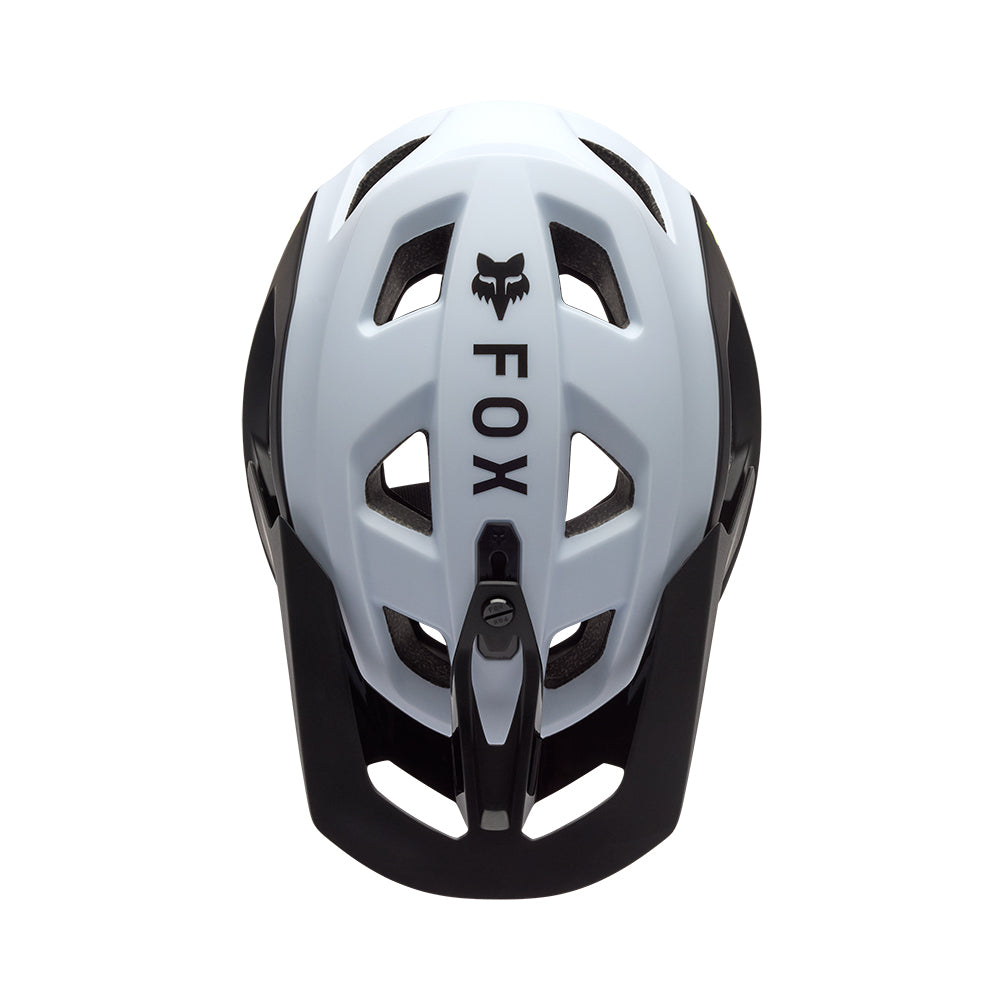 White and black helmet with Fox logo on a white background