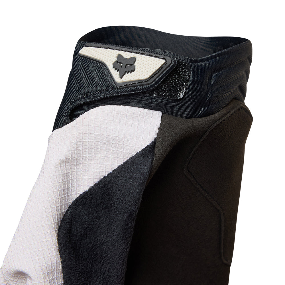 Close-up of a protective knee pad with a brand logo on a white background