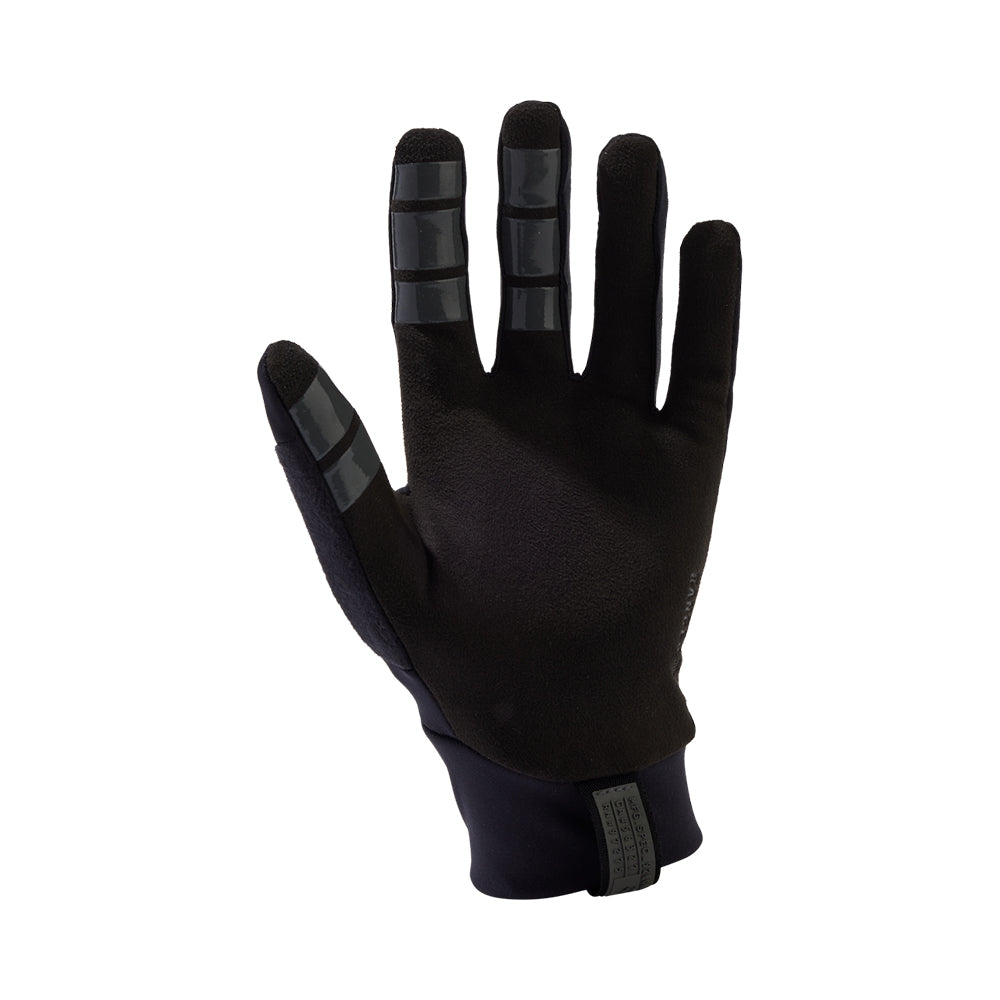 Black glove with touchscreen fingers on a white background
