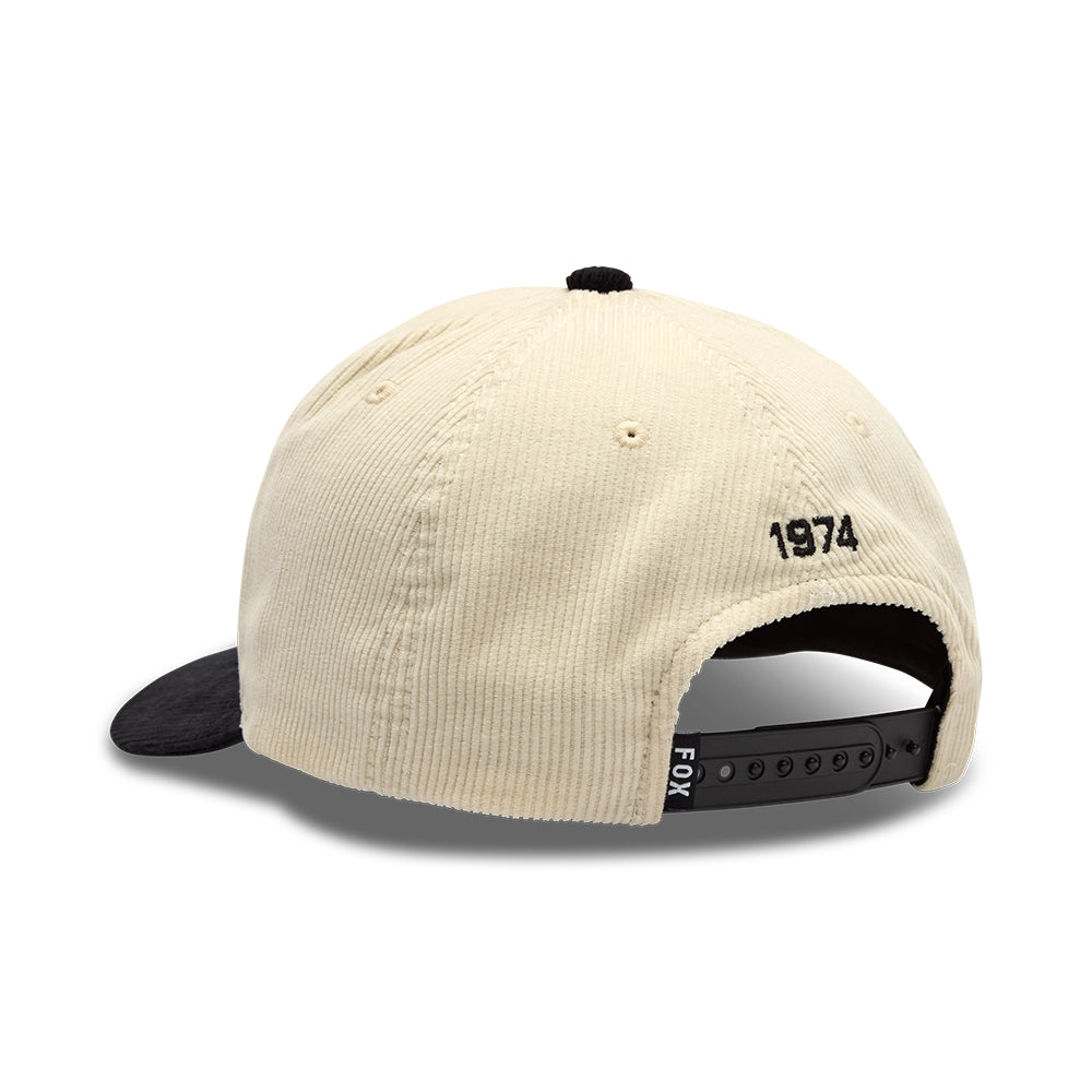 Beige cap with black visor and '1974' branding on a white background