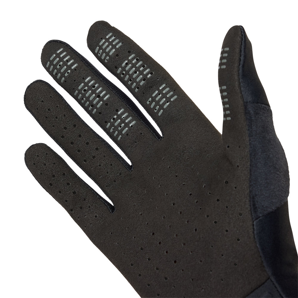 Black glove with textured palm on a white background