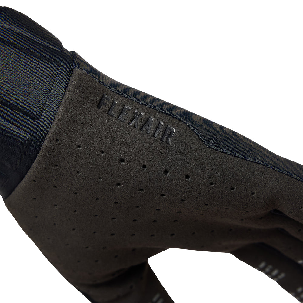 Black equestrian leg guard with 'FLEXAIR' branding on a white background