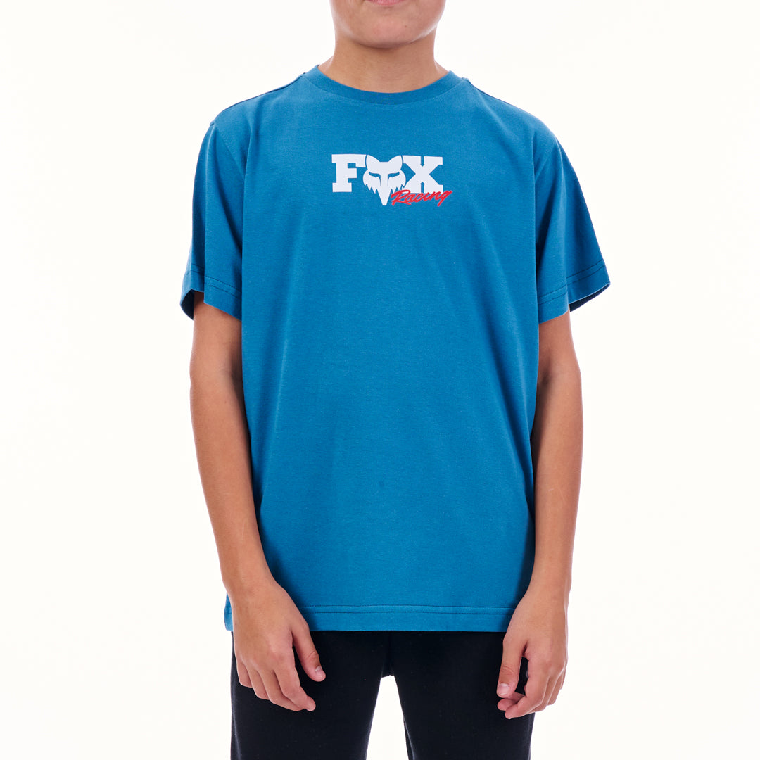 Person wearing a blue t-shirt with a logo on a white background