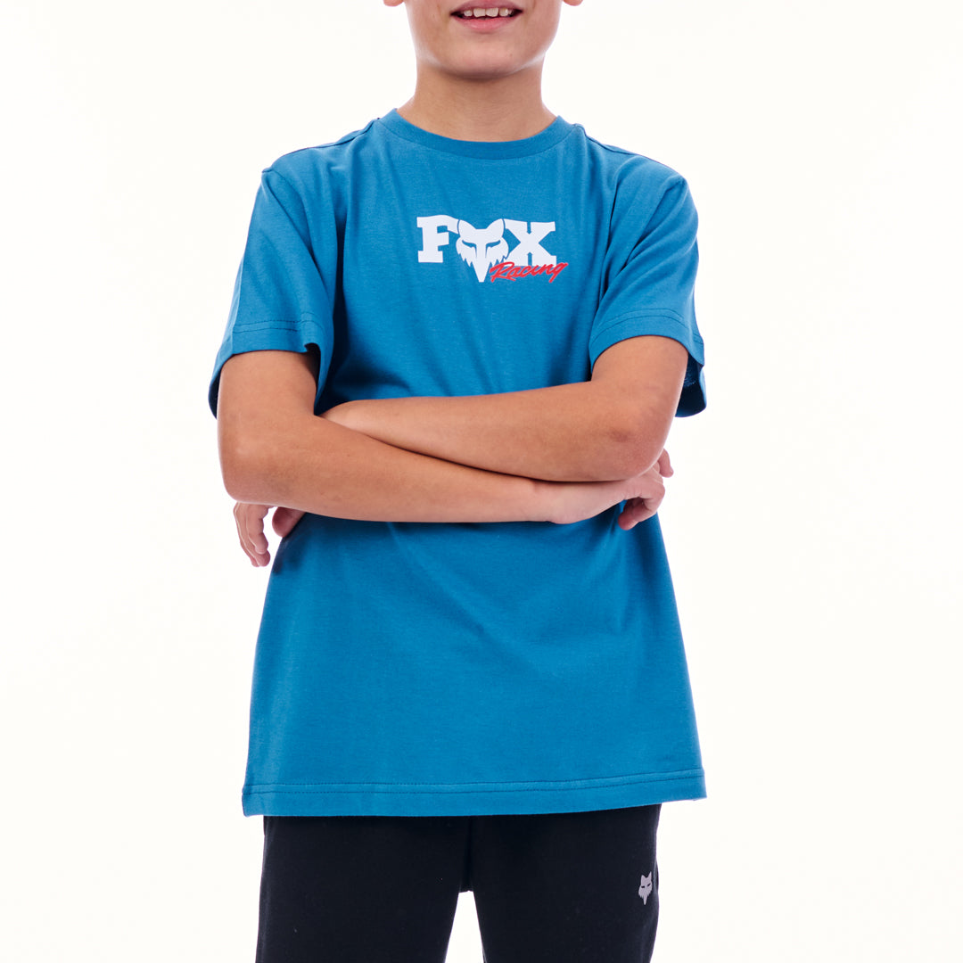 Person wearing a blue t-shirt with a logo on a white background