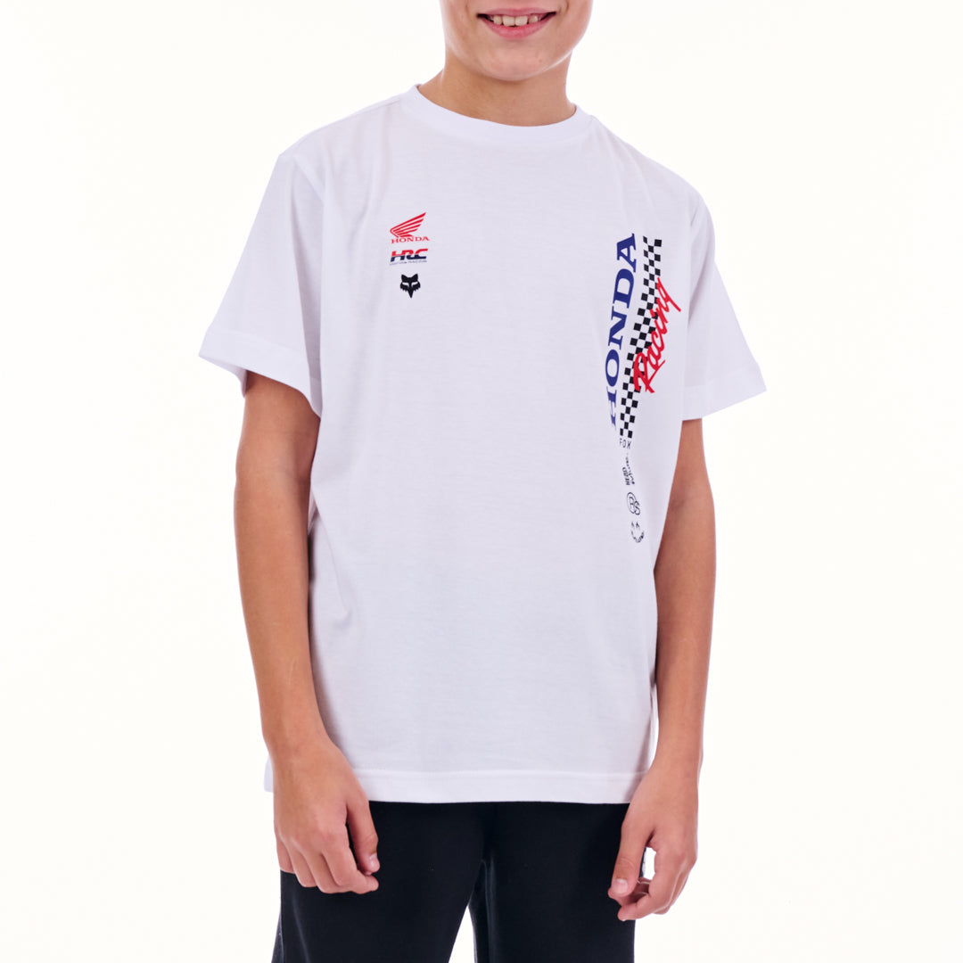 Child wearing a white t-shirt with racing graphics on a white background