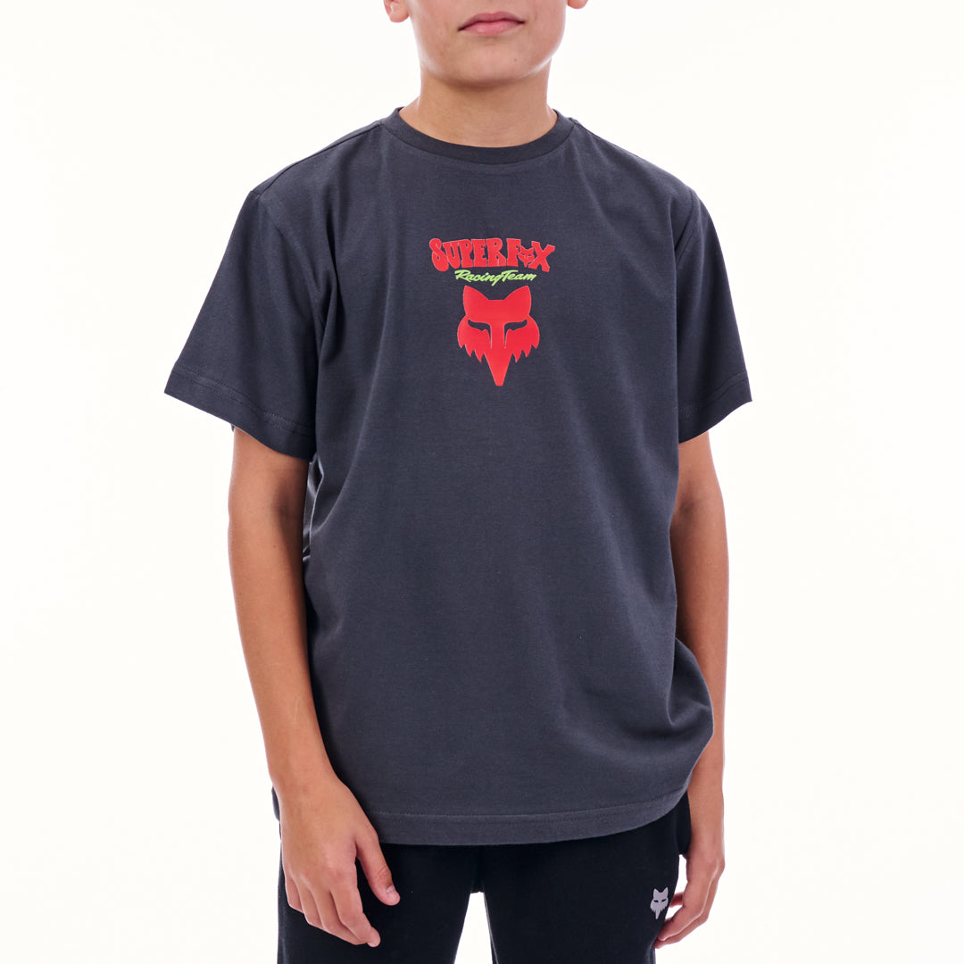 Child wearing a dark gray t-shirt with a red and white logo on a white background