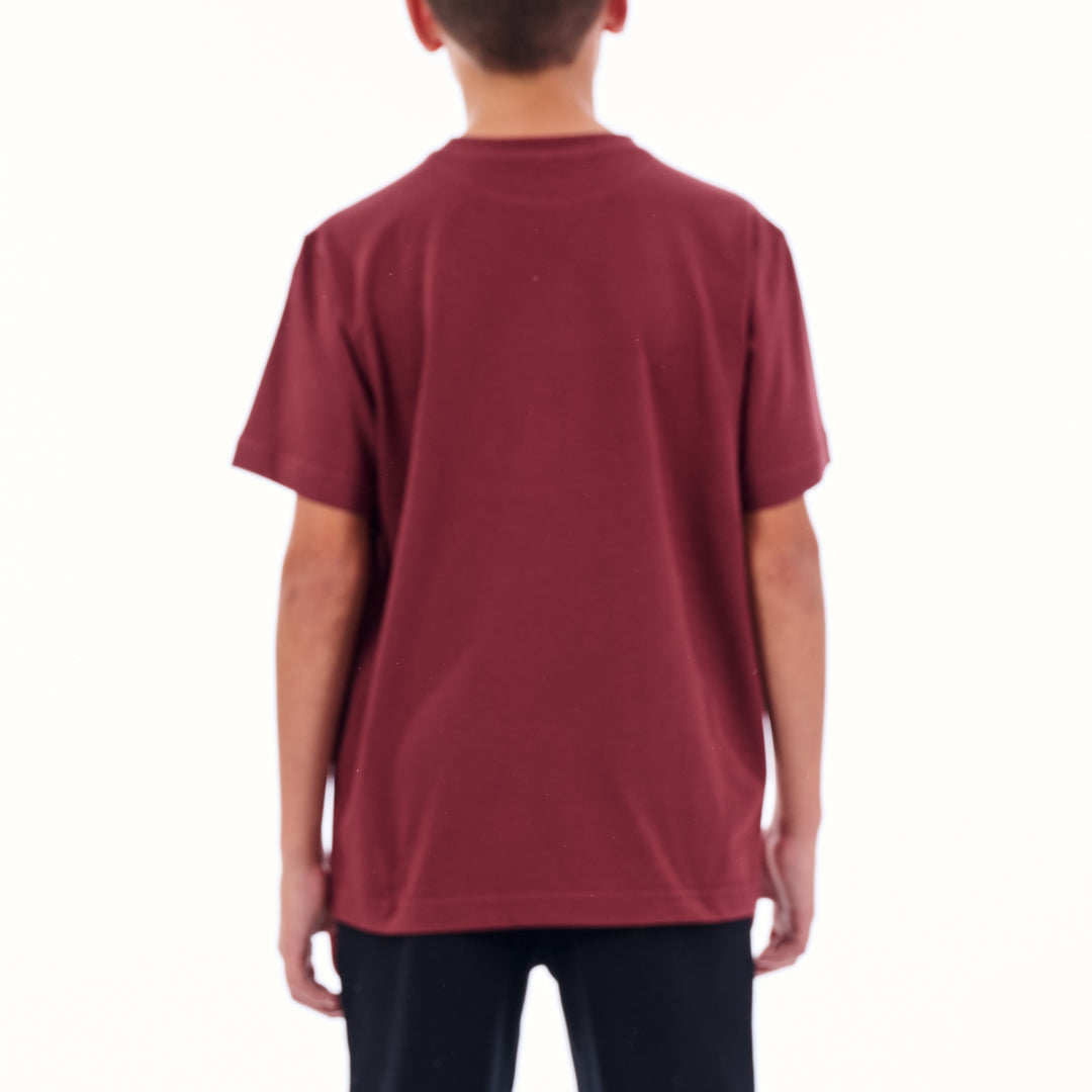 Person wearing a maroon t-shirt on a white background