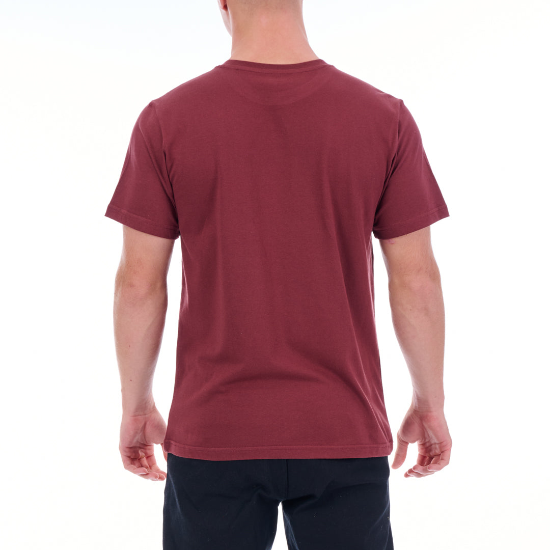 Person wearing a maroon t-shirt on a white background