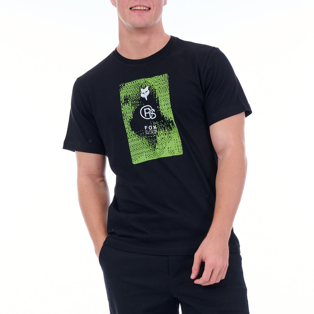 Person wearing a black t-shirt with a green graphic design on a white background