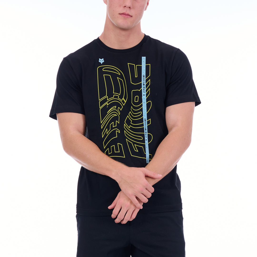 Person wearing a black t-shirt with yellow graphics and a measuring tape on a white background