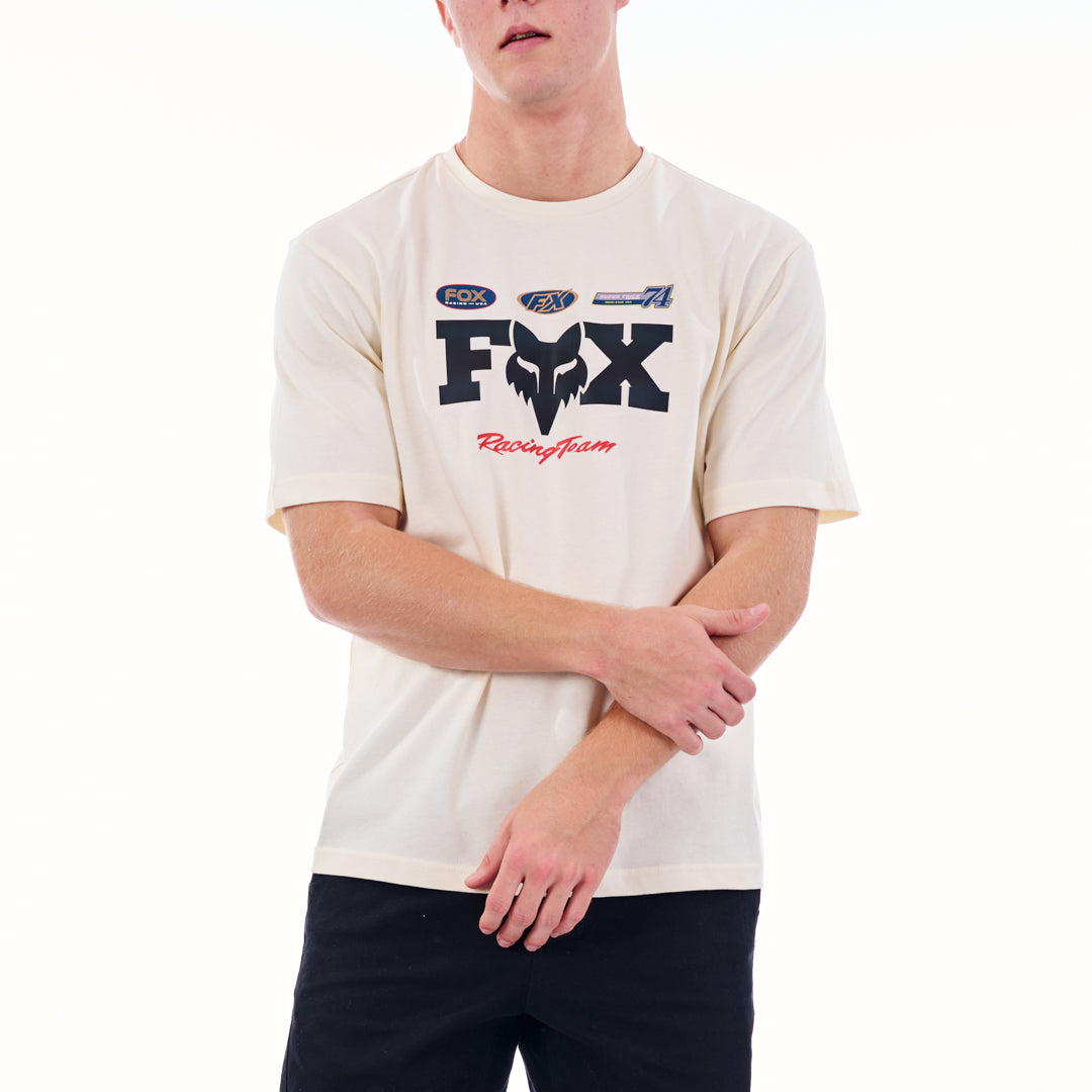 Person wearing a white t-shirt with Fox Racing logo on a white background