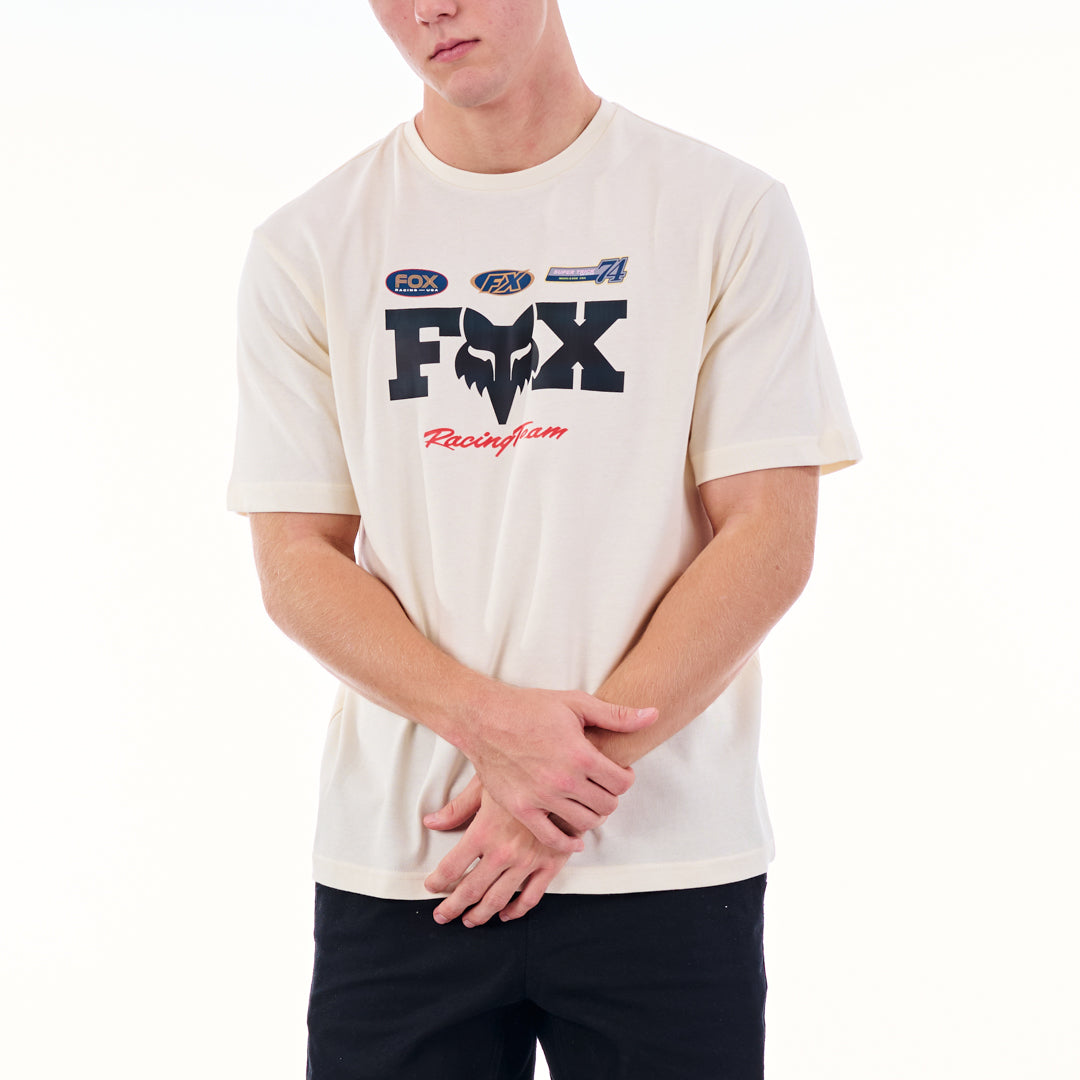 Person wearing a white t-shirt with Fox Racing logo on a white background