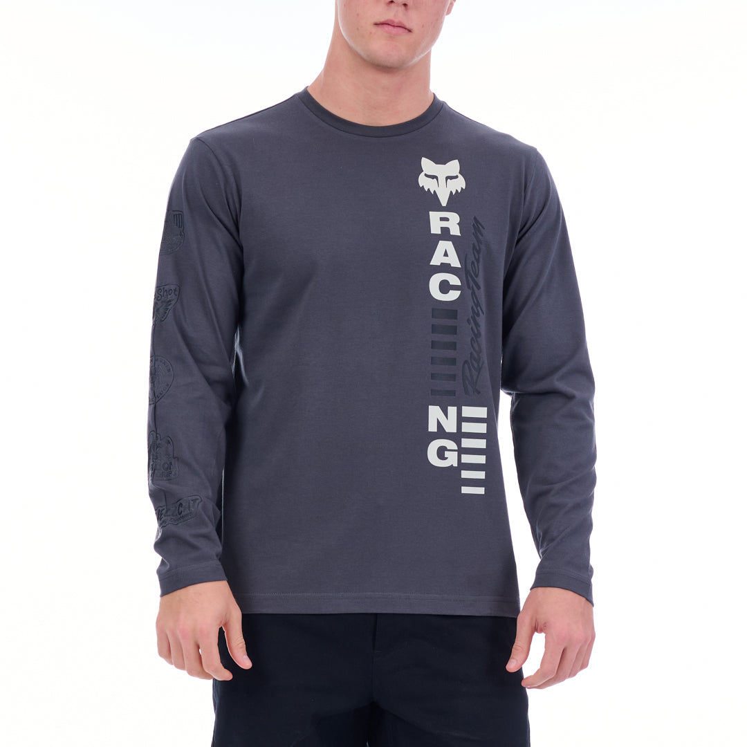 Person wearing a gray long-sleeve shirt with a brand logo and text on a white background