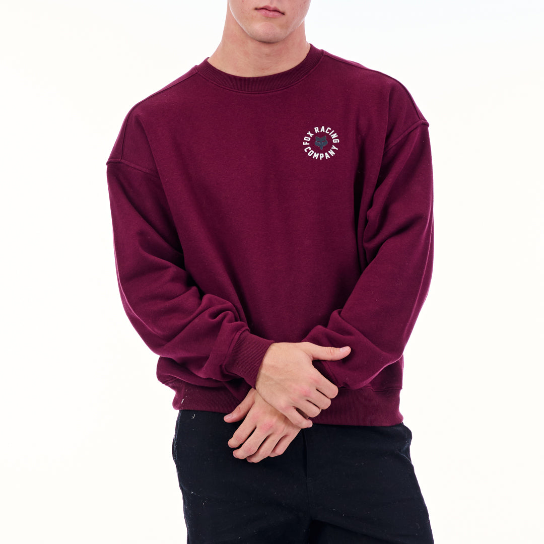 Maroon sweatshirt with a logo on a white background