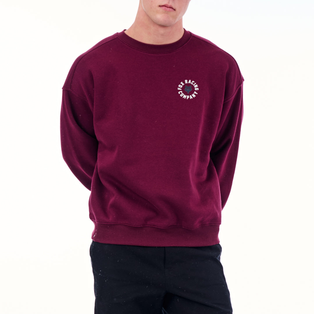 Maroon sweatshirt with a logo on a white background