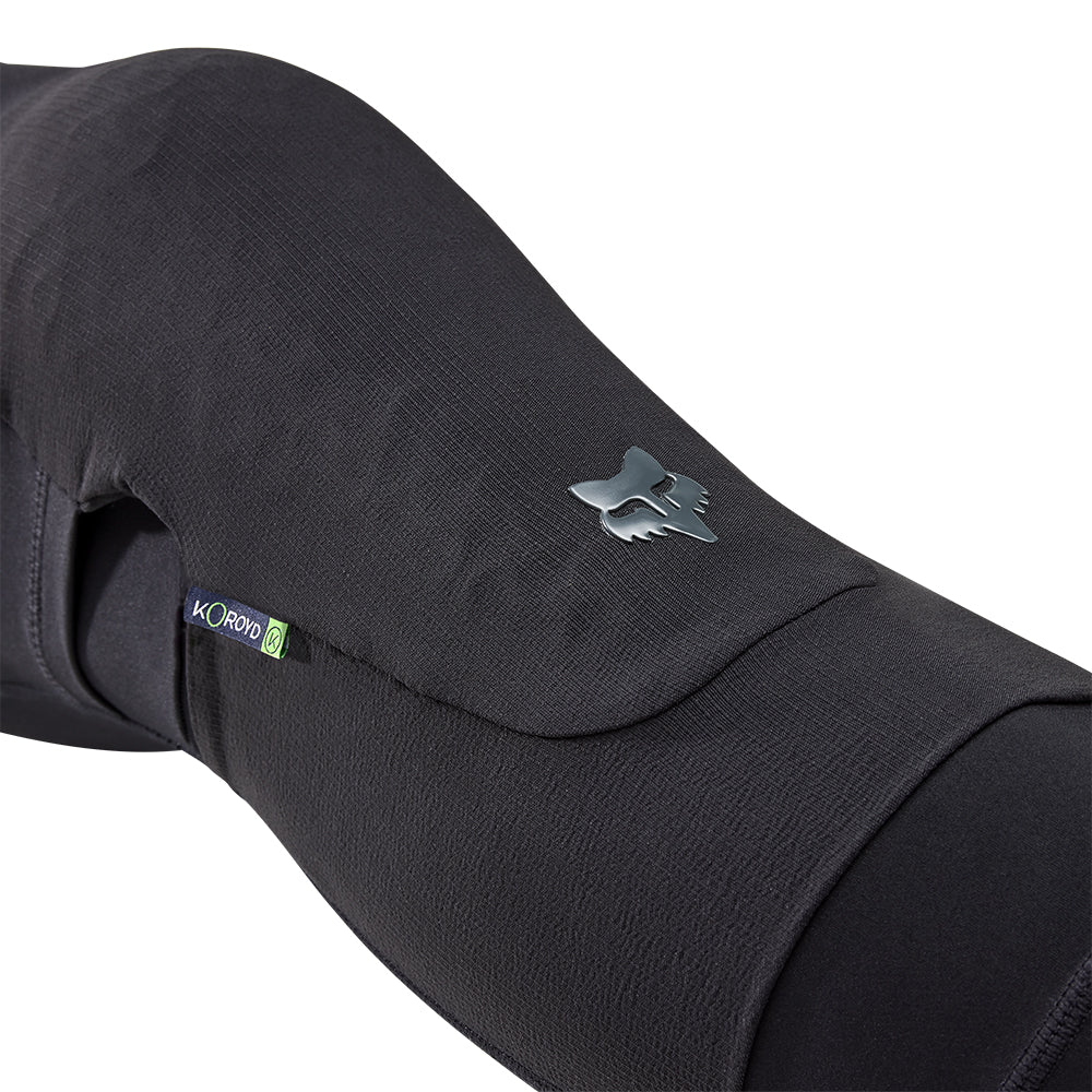 Black long-sleeve shirt with a brand logo on a white background
