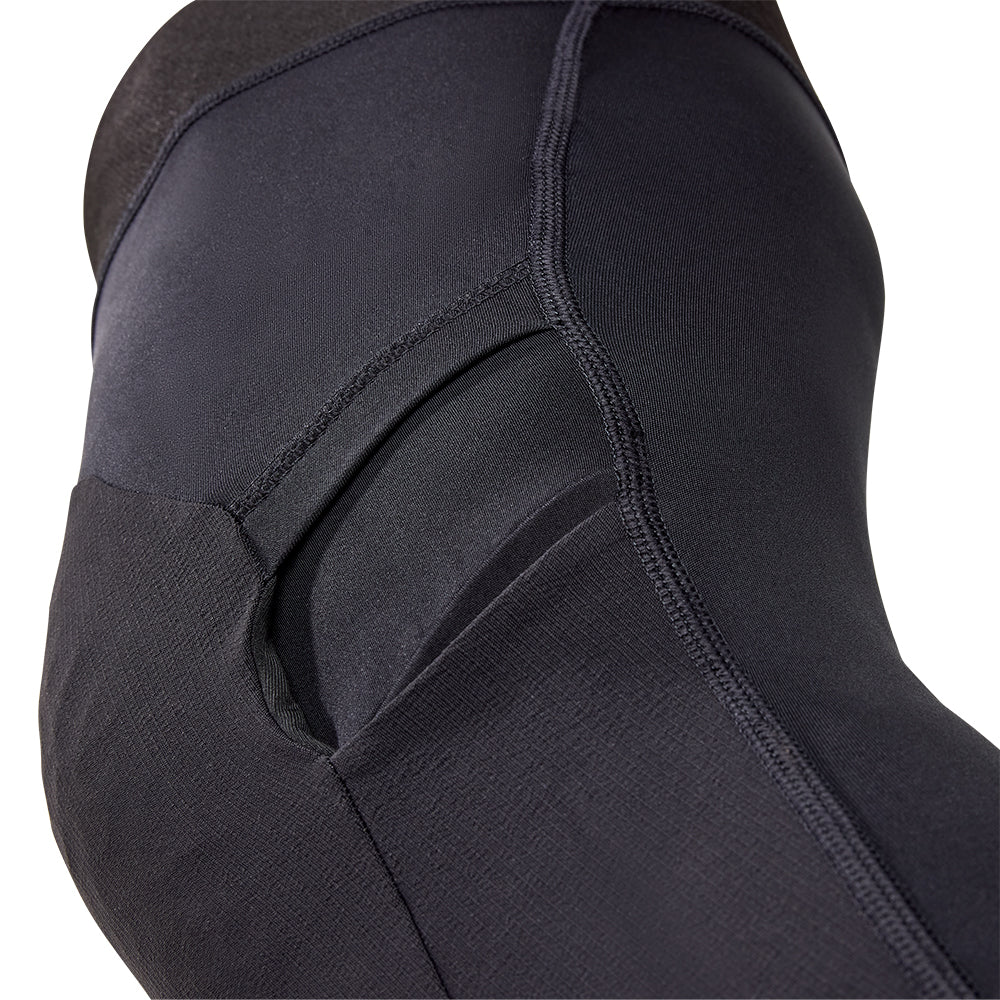Close-up of a black wetsuit on a white background