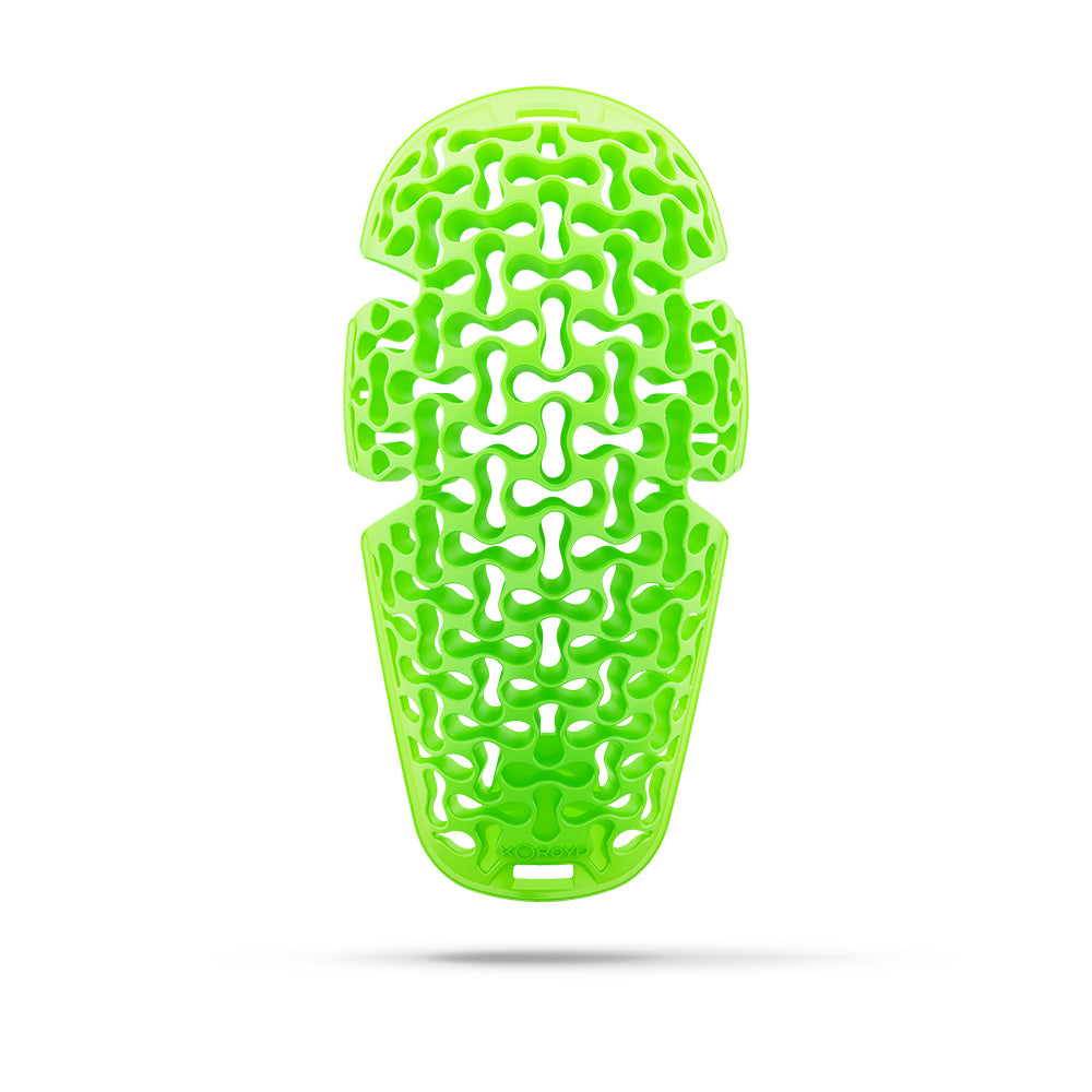 Green textured object on a white background