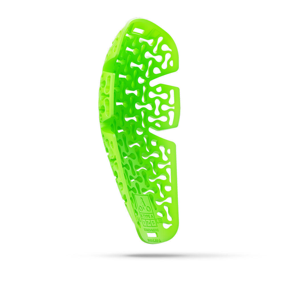 Green shoe sole with unique pattern on a white background