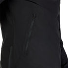Close-up of a black jacket with a zipper detail on a white background