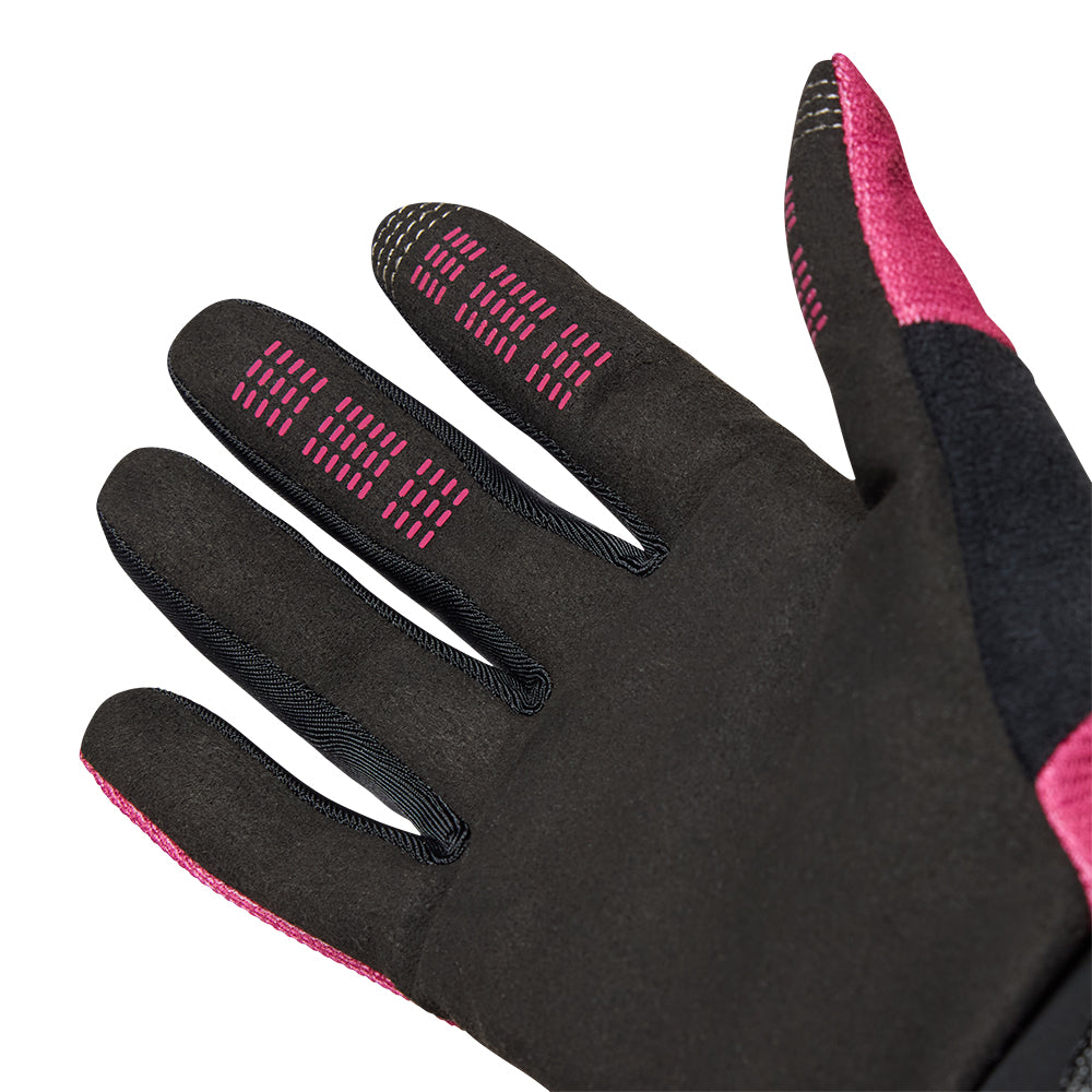 Black and pink glove with textured palm on a white background
