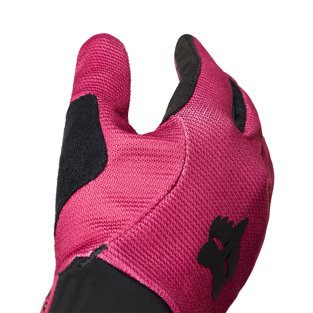 Close-up of a pink glove with black accents on a white background