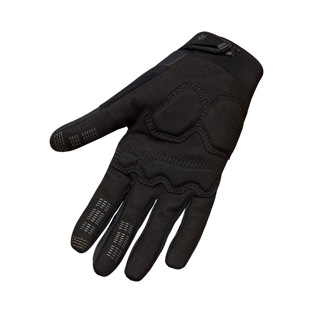 Black tactical glove on a white background