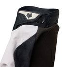 Close-up of a protective knee pad with a brand logo on a white background
