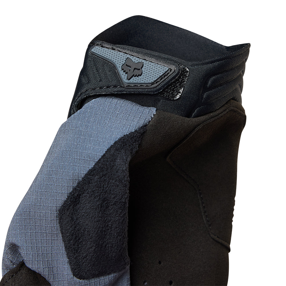 Close-up of a black and gray glove with a brand logo on a white background
