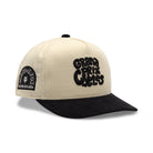Beige and black cap with 'Grand Prix Cycles' logo on a white background