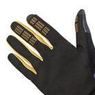 Black gloves with gold accents on a white background