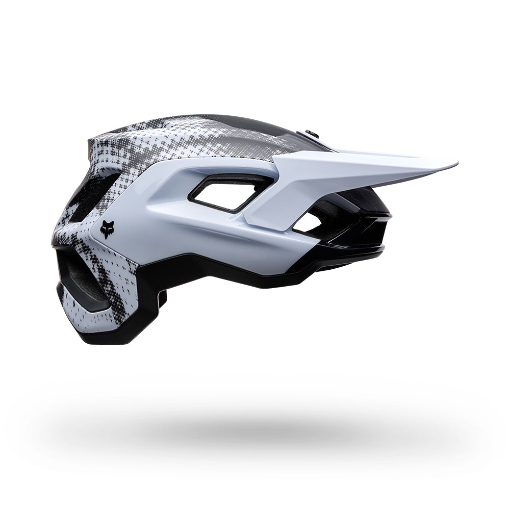 White and black helmet with a unique design on a white background