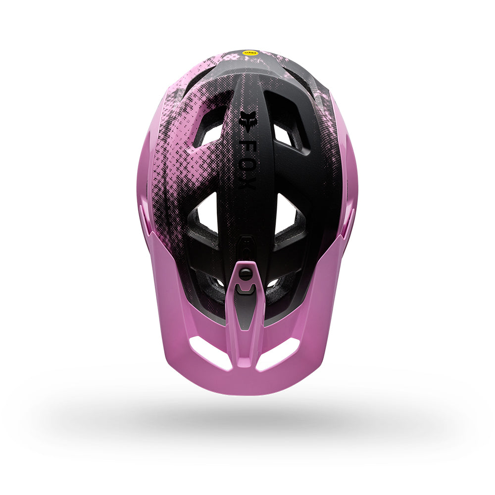 Pink and black helmet with 'Fox' branding on a white background