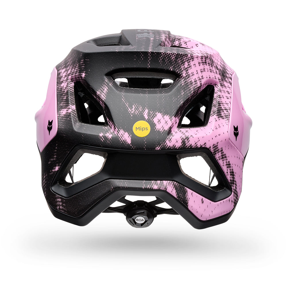 Pink and black helmet with a visible brand logo on a white background