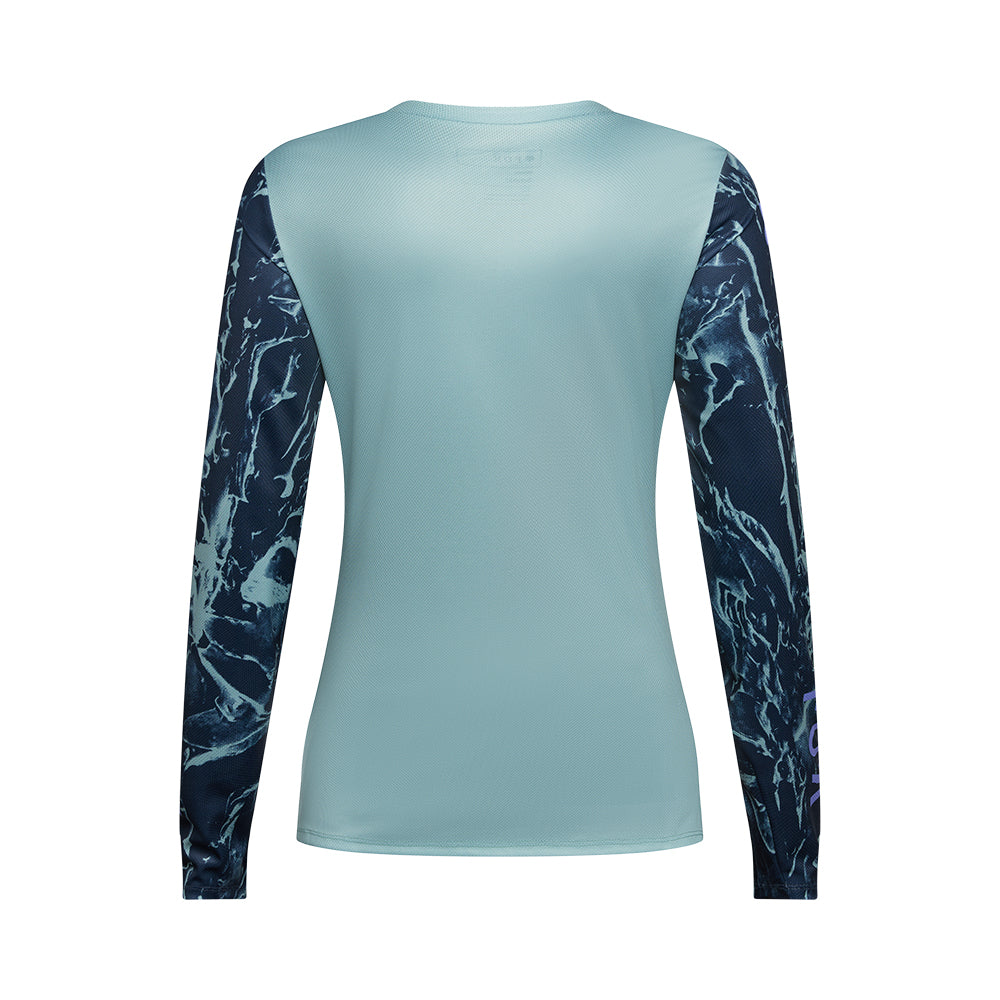 Light blue long-sleeve shirt with dark blue marble pattern on sleeves against a white background