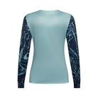 Light blue long-sleeve shirt with dark blue marble pattern on sleeves against a white background