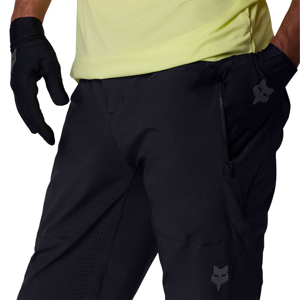 Black pants with a brand logo on a white background