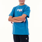 Child wearing a blue t-shirt with a logo on a white background