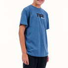 Person wearing a blue t-shirt with a logo on a white background