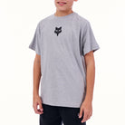 Child wearing a gray t-shirt with a black logo on a white background