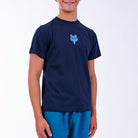 Person wearing a navy blue t-shirt with a blue fox logo on a white background