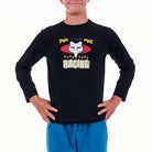 Person wearing a black long-sleeve shirt with a graphic design on a white background