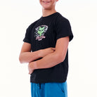 Person wearing a black t-shirt with a graphic design on a white background