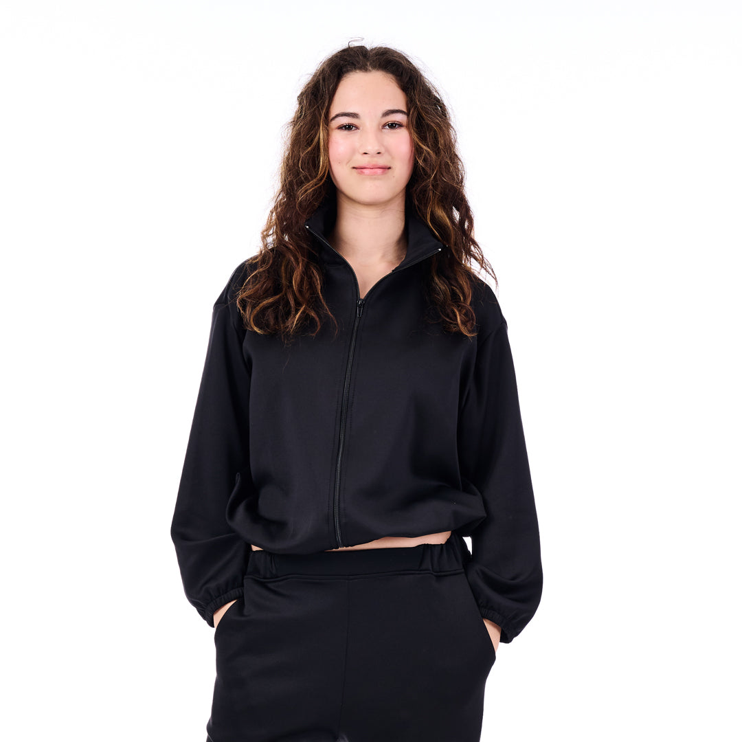 Person wearing a black outfit on a white background