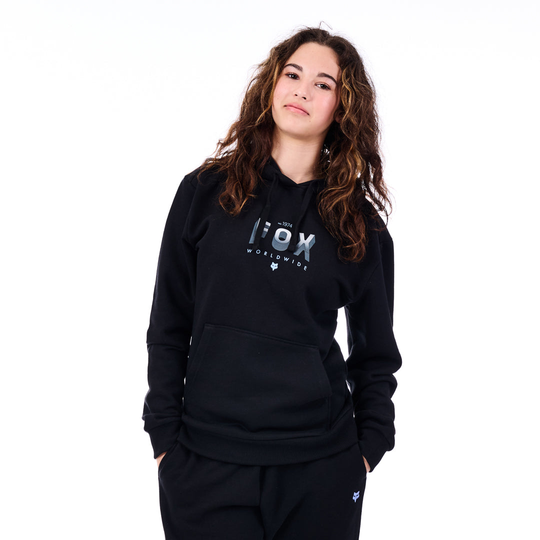 Person wearing a black hoodie with a logo on a white background