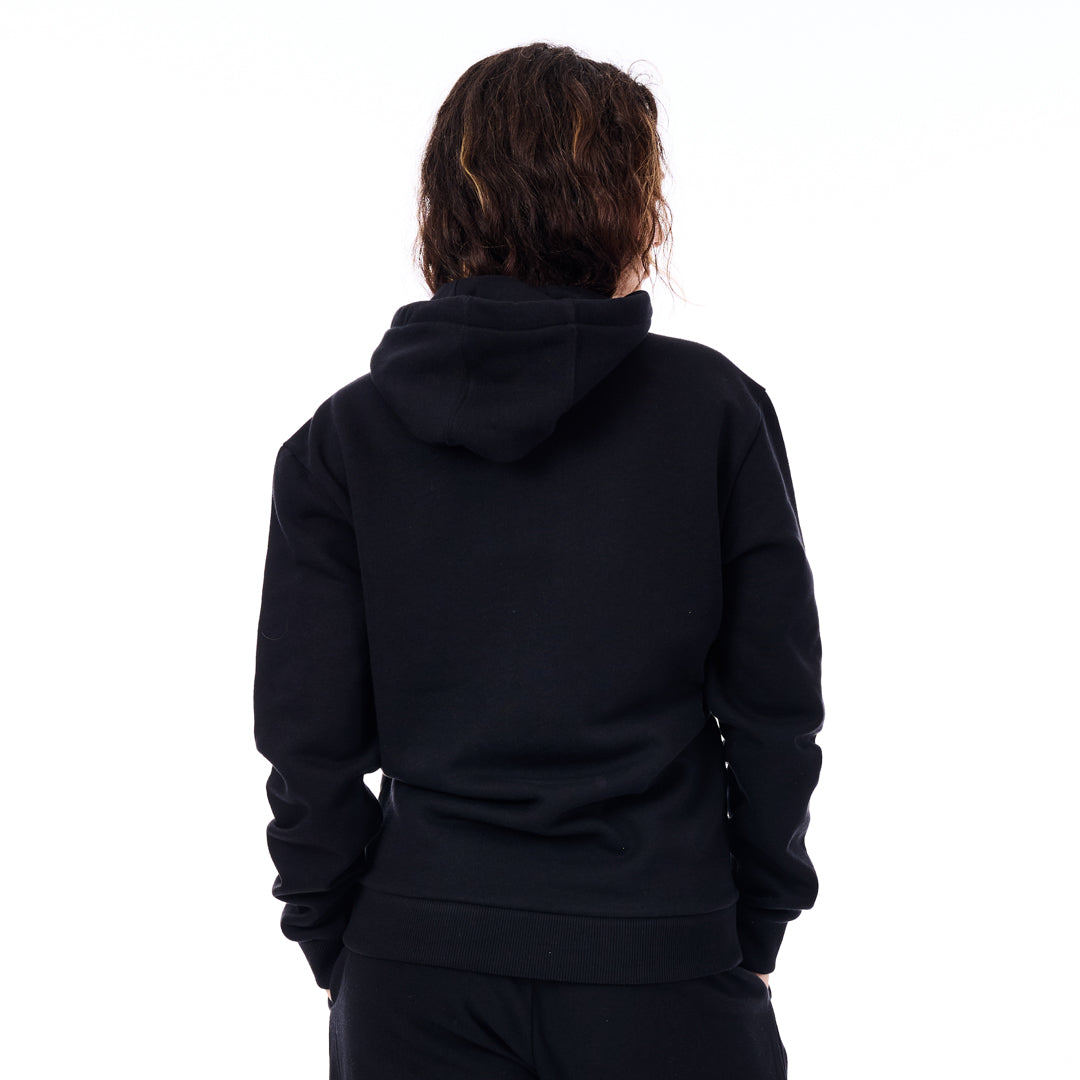 Person wearing a black hoodie from behind on a white background
