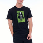 Person wearing a black t-shirt with a green graphic design on a white background