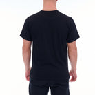 Person wearing a black t-shirt on a white background