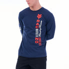Blue long-sleeve shirt with red and white text and graphics on a white background
