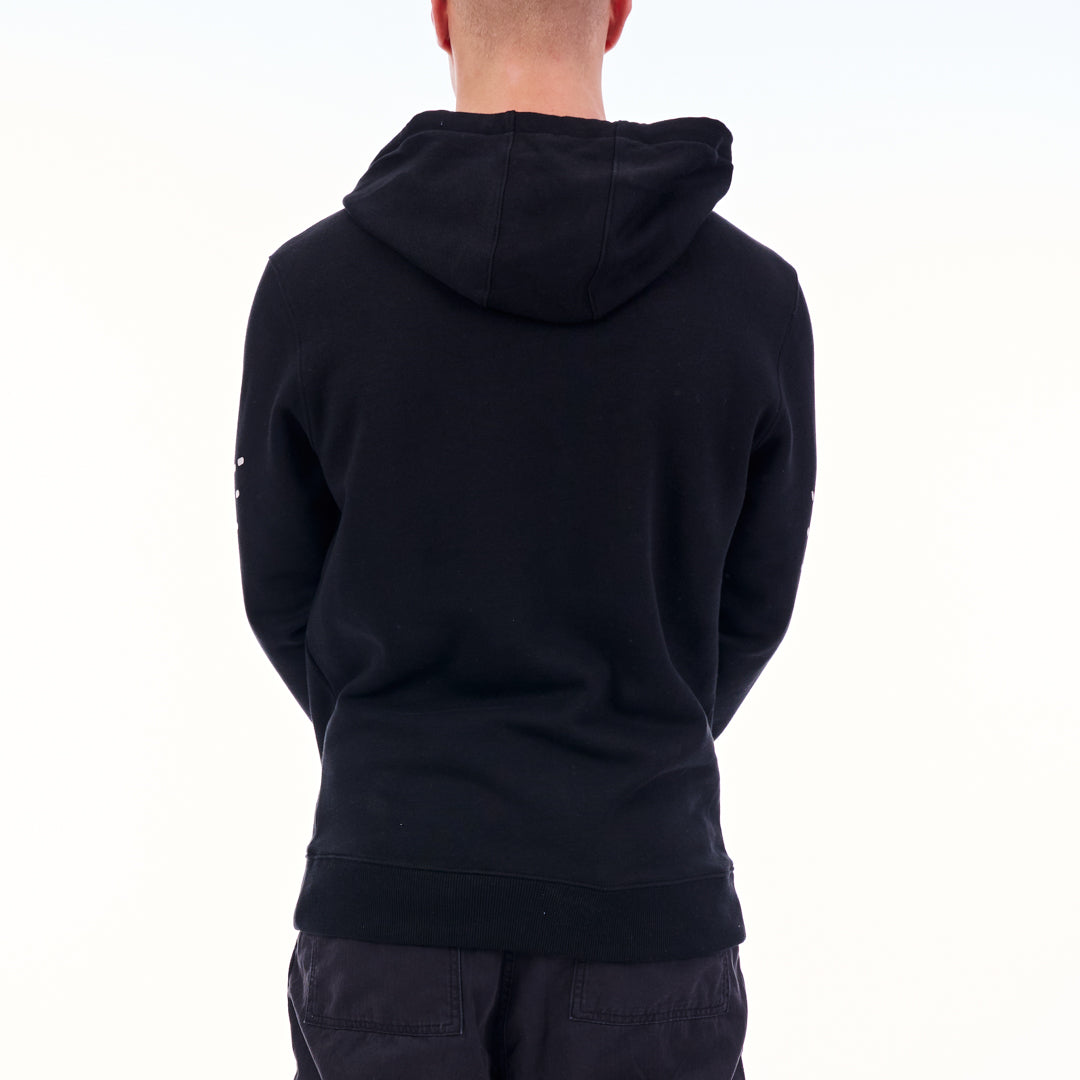 Person wearing a black hoodie from behind on a white background